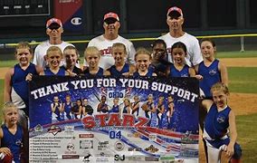 Ohio Starz team with banner