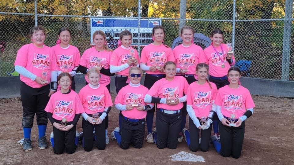 Ohio Starz team with trophies