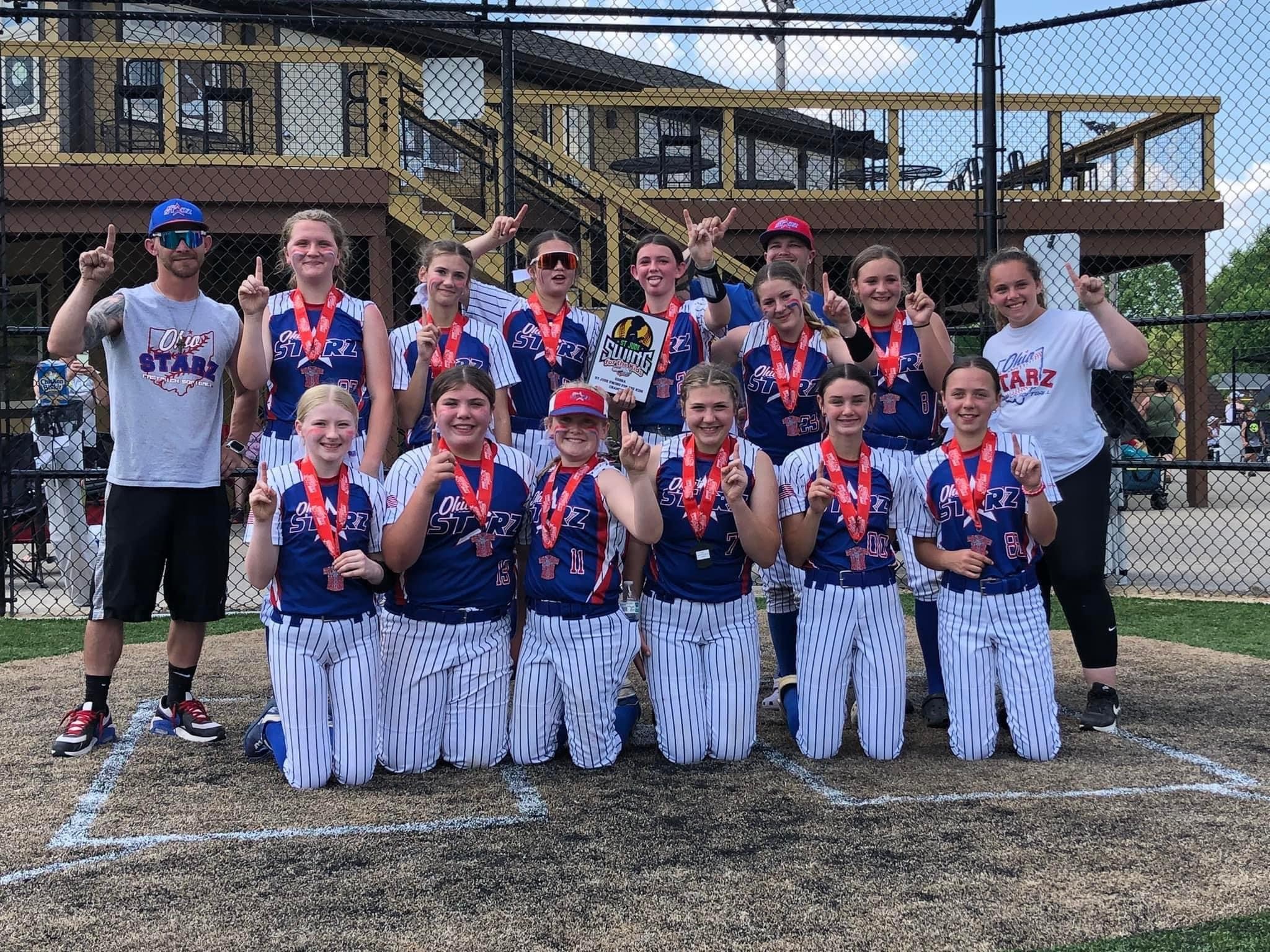 Ohio Starz team with medals